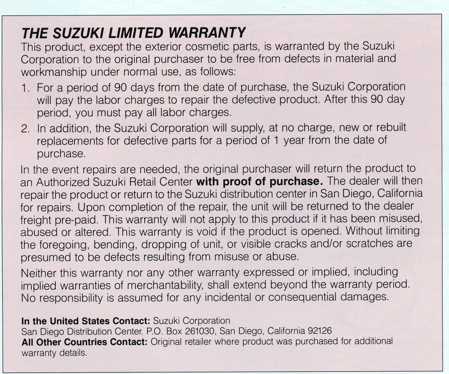 Pink printed panel containing the original Suzuki limited warranty.