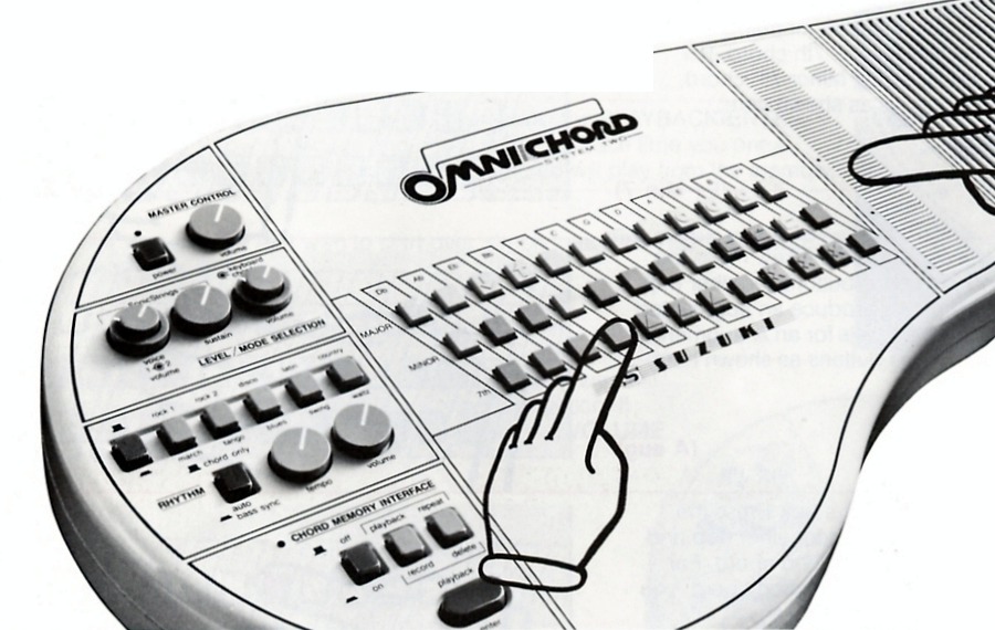 Hands selecting a chord and strumming the SonicStrings Strumplate.